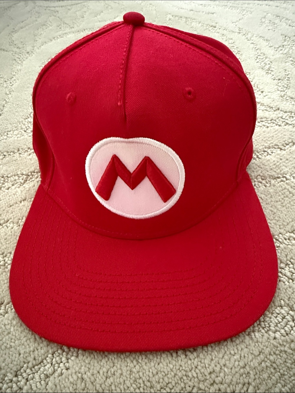 NINTENDO SUPER MARIO Red Kids Snapback Hat with “M” Logo. OS